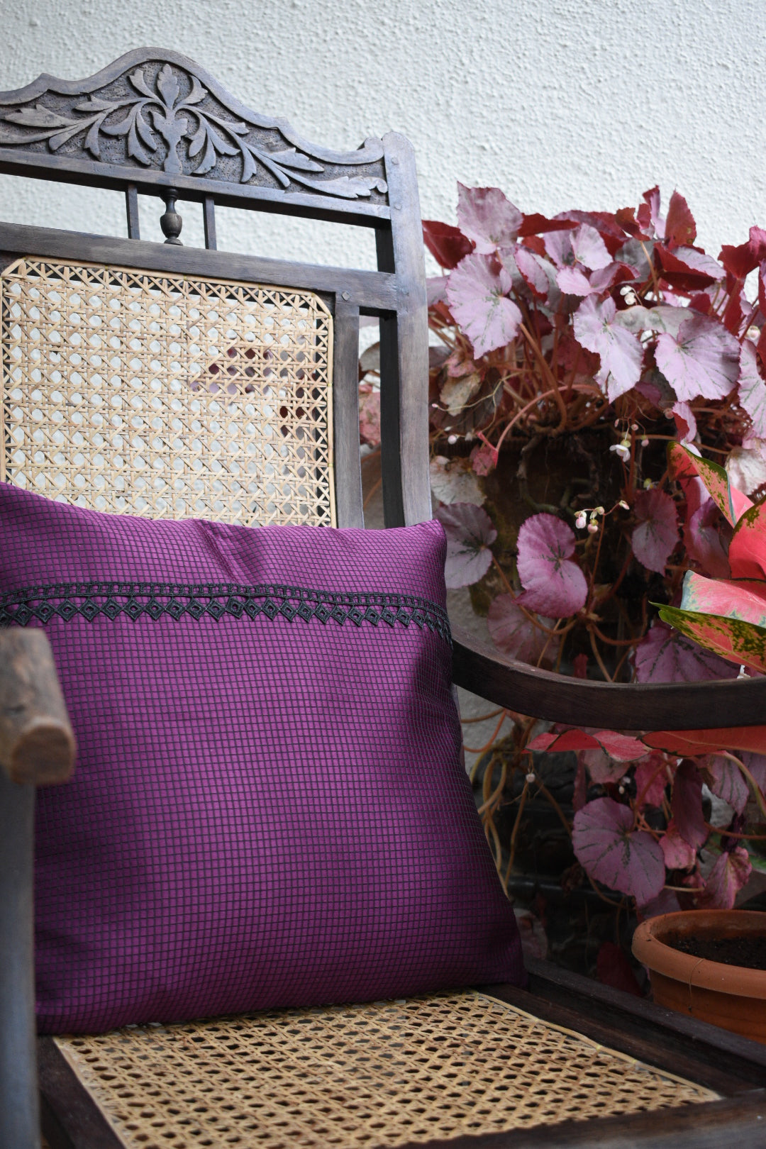Wine-coloured chequered silk cushion cover