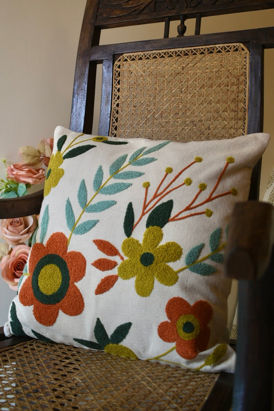 Orange embroidered flower cushion cover