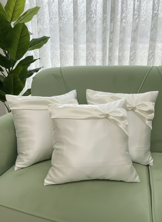 Satin Cushion cover decorated with a bow and bead.  Set of 2
