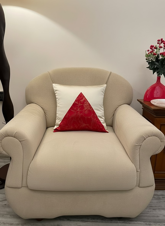 Cream Satin Cushion Cover with a red triangle patch.